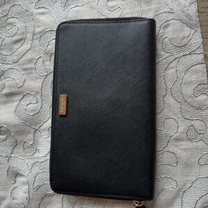 Kate spade Talla laurel way Black Clutch /wristlet with Gold Logo